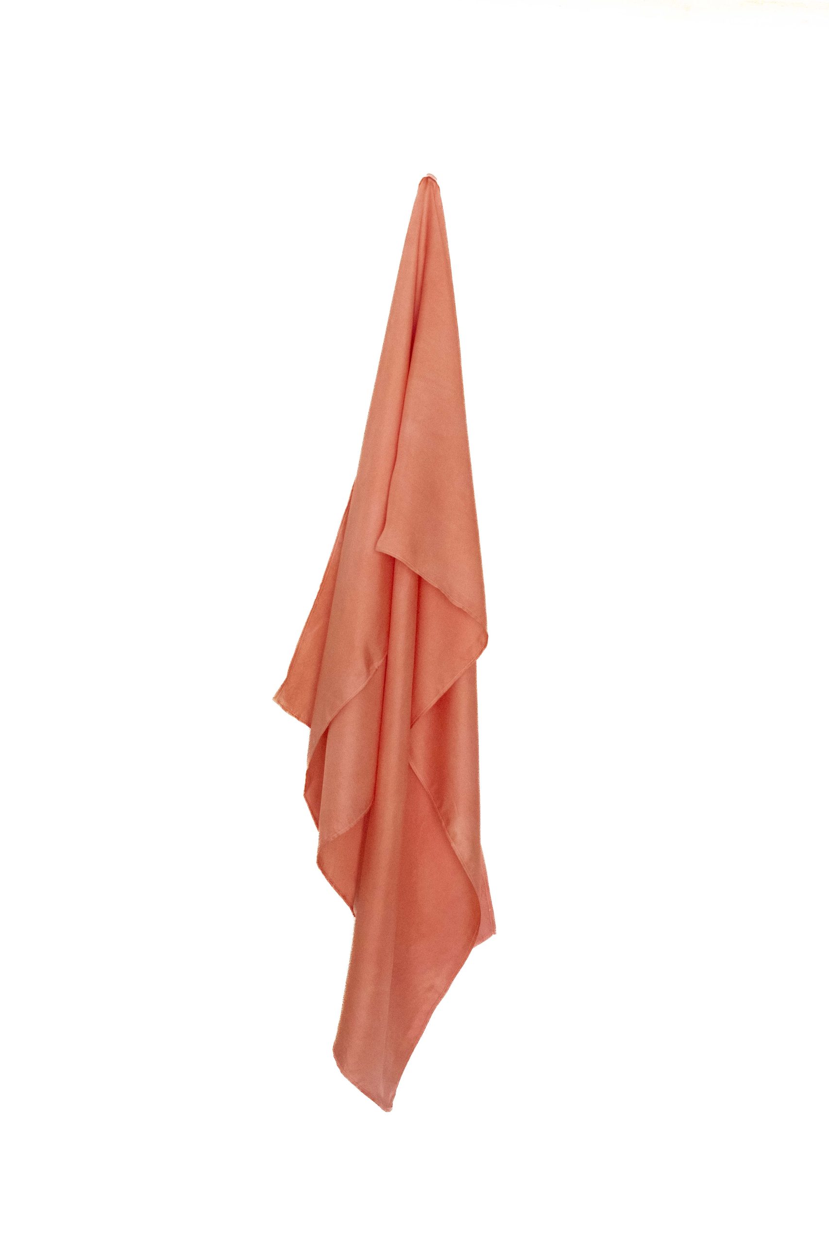 Hand-dyed silk scarf in sun coral tones, rectangle shape (150x50 cm), ideal as a Jewish head covering or tichel.